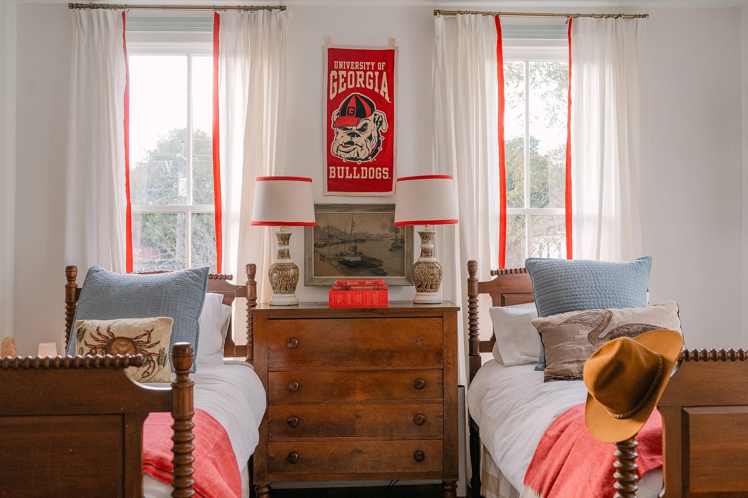 A “big kid” room for twin boys that features ships, some fun pops